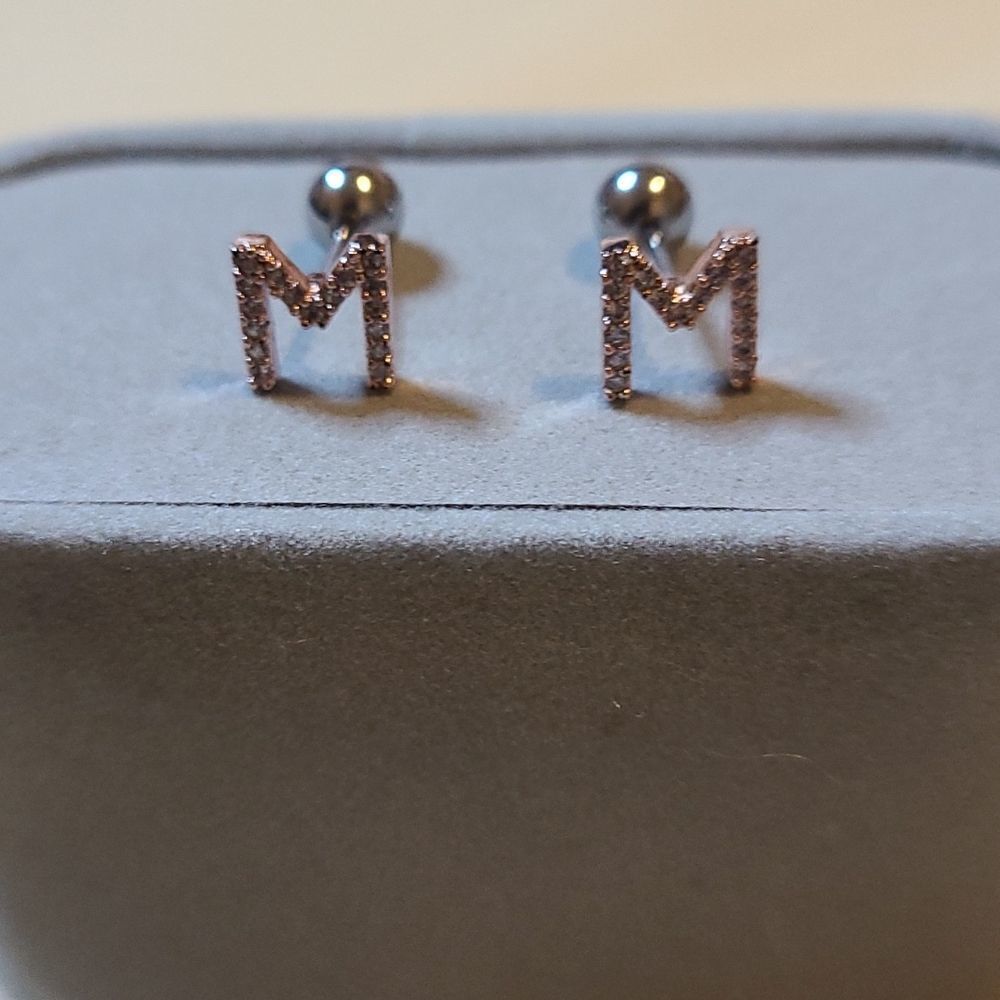 MOOHAM "M" letter earings. Rose gold plated with extra pieces.